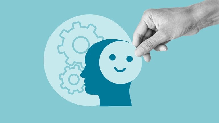 Dopamin: Grafik eines Gehirns mit einem lächelnden Smiley